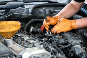 Mechanic-working-on-a-diesel-filter-close-up-629x419-Copy